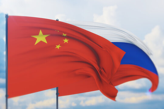 Waving Russian flag and flag of China. Closeup view, 3D illustration.