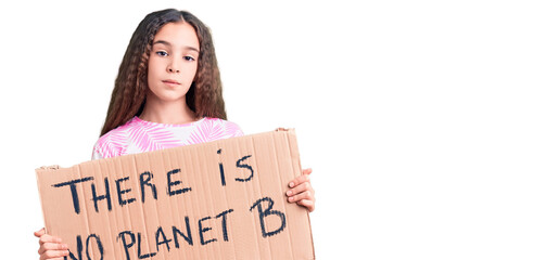 Cute hispanic child girl holding there is no planet b banner thinking attitude and sober expression...