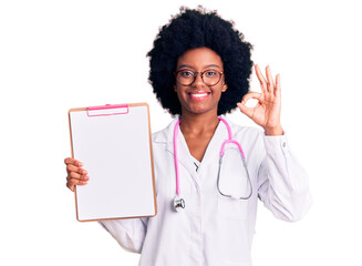 Young african american woman wearing doctor stethoscope holding clipboard doing ok sign with fingers, smiling friendly gesturing excellent symbol