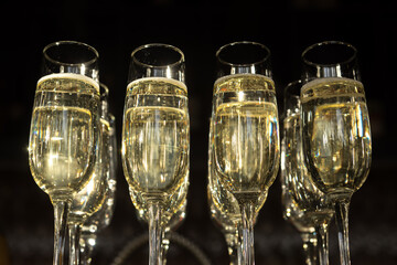 Champagne cool poured into glass glasses