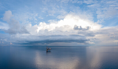 Panoramic aerial view from a drone of an offshore jack up rig at the offshore location during day time