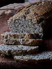 Coconut bread with flax seed on wood. Keto diet concept.