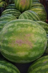 Up close of a basket full of watermelons at the Carolina Beach Farmer's Market