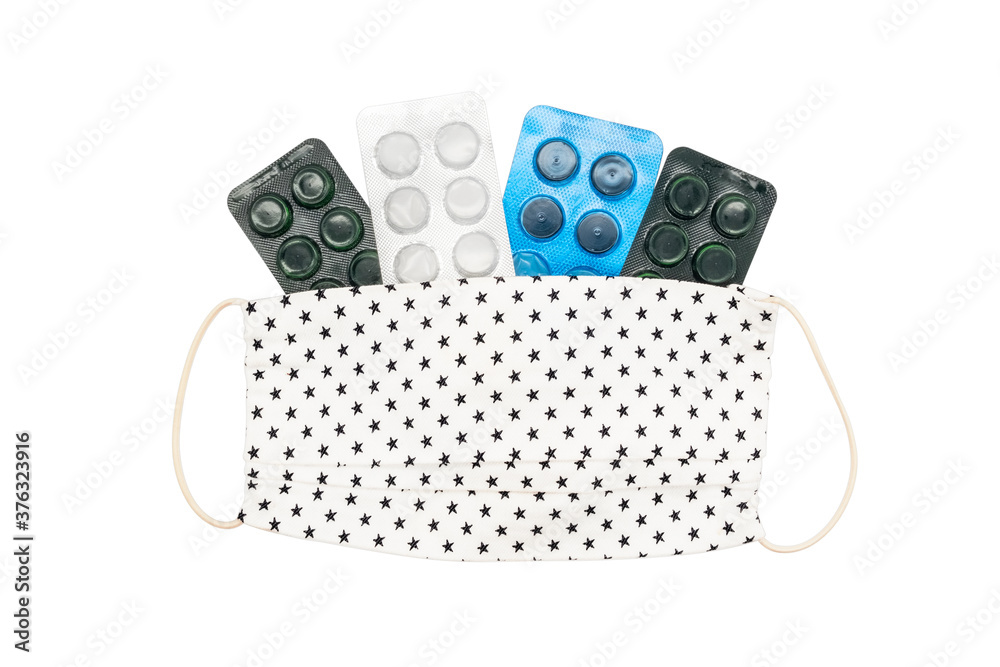 Wall mural isolated photo of mask and pills on white background