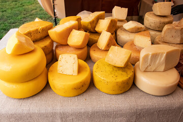 many heads of cheese on the table