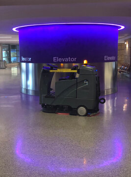 Automated floor cleaning machine at an empty Tucson International Airport in Arizona