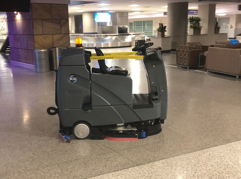 Automated floor cleaning machine at an empty Tucson International Airport in Arizona