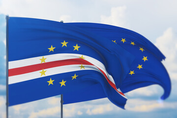 Waving European Union flag and flag of Cape Verde. Closeup view, 3D illustration.