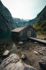 Obersee Lake autumn landscape. Stone in crystal water in Berchtesgaden National Park