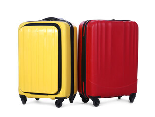 Stylish suitcases packed for travel on white background. Summer vacation