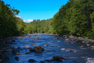 Fototapeta na wymiar Northwest view of the Farmington River, located at Unionville, CT 