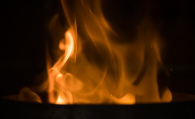 Background of hot wood charcoal and firewood.