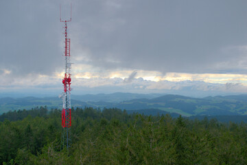 View from the lookout tower Breitenstein in Kirchschlag towards the sent-towers during storms and rain