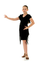Fototapeta premium A cheerful little girl is dancing.The concept of a school of dance.