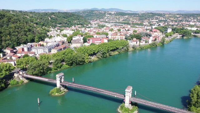 Picturesque view from drone of Givors summer cityscape on Rhone riverbanks, Auvergne-Rhone-Alpes region, France