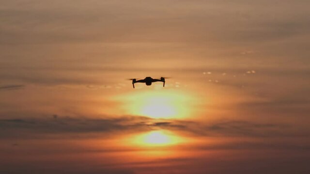 drone flying with beautiful sunset or sunrise background