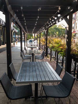 Empty Covered Outdoor Restaurant Patio Seating In City