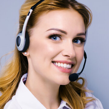 Call Center Service. Customer Support Or Sales Agent. Businesswoman Or Caller Or Receptionist Phone Operator In Headset. Helping, Answering, Consulting. Grey Color Background. Square Composition.