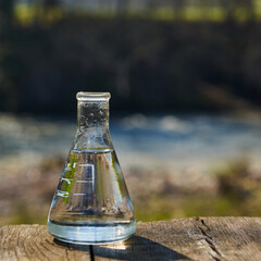 Glass flask with clean drinking water.