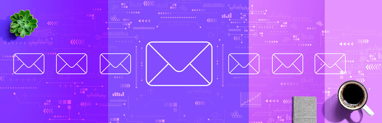 Email concept with a cup of coffee and a notebook