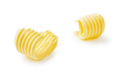 Butter curls or butter rolls isolated on white background