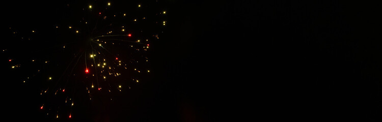 Beautiful fireworks against the dark blue sky. Background with a salute. Banner