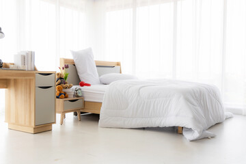 Fototapeta na wymiar Comfortable and bright modern bedroom. Bed room interior