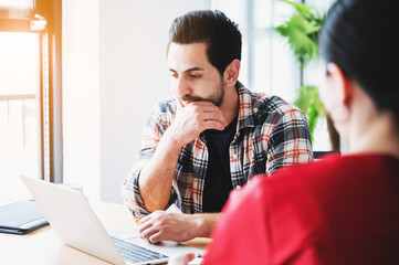 Coworking process, Corporate employees team working brainstorm project document sheet paperwork. Business startup company teamwork on meeting in modern office