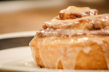 Delicious hot cinnamon roll with icing