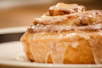 Delicious hot cinnamon roll with icing