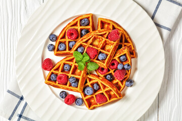 oatmeal banana waffles with berries, top view