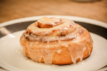 Delicious hot cinnamon roll with icing