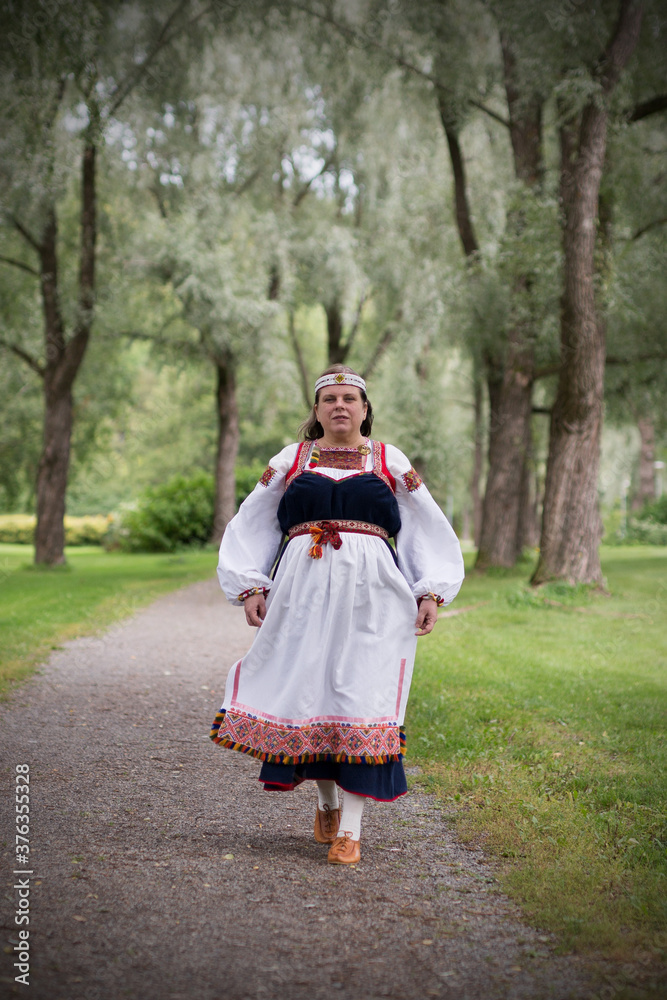 Wall mural Woman wearing Finnish-Ingrian national costume, 