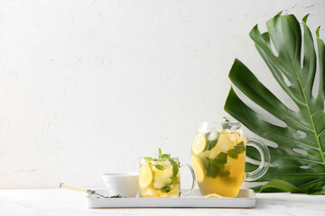 Tasty cold ice tea on table