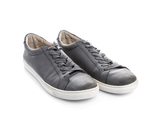 Pair of casual male shoes on white background