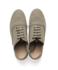 Pair of casual male shoes on white background