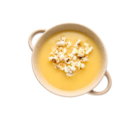 Pot with tasty popcorn soup on white background