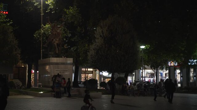 The atmosphere at night with people in the middle of the karditsa city.