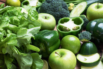 Background of fresh green vegetables and herbs. Close up.