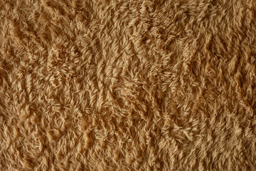 Closeup brown carpet for backgrounds and textures