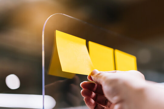 Senior woman supports Breast Cancer Day by holding Pink Ribbon Breast Cancer Awareness. Healthcare and medicine concept. October Pink day. World Cancer Day.