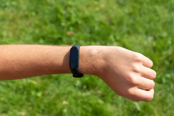 Close-up Of A Person Hand Wearing Smart Watch. fitness man using smart watch.