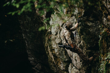 Soldier on the rocks