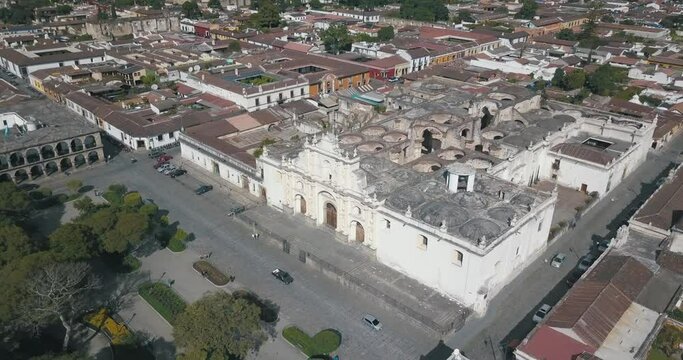 Aerial drone shot of cathedral San Jose in a colonial town, Antigua Guatemala