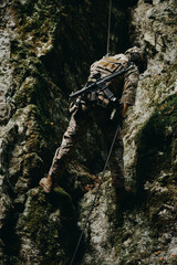 Soldier on the rocks