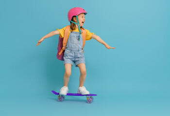 Cute child with skateboard