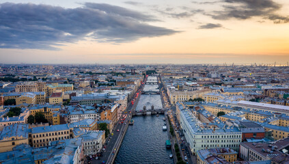 Aerial view of the city at sunset in Saint Petersburg, Panorama of the Fontanka River and the bridges across it. View of the city from above. Cities of Russia. Petersburg in the summer.