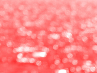 Red and pink blurred defocused bokeh background, Christmas and New Year concept