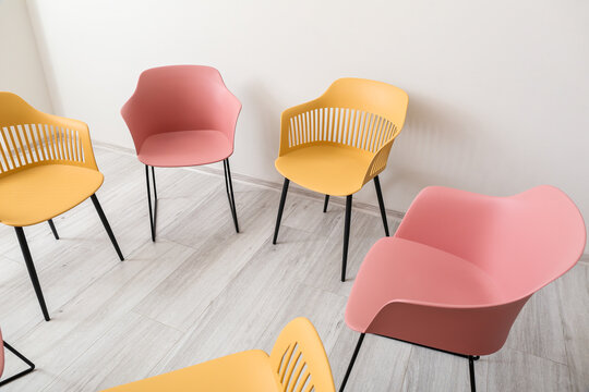 Empty Chairs Prepared For Group Therapy In Psychologist's Office