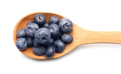 Spoon with tasty blueberry on white background